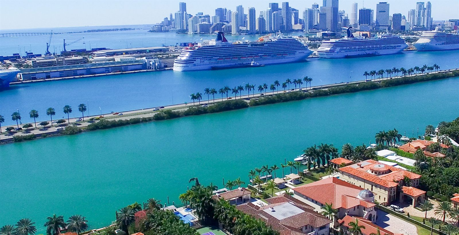 Aerial view of a busy Florida cruise port with ships docked